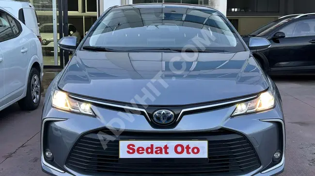 TOYOTA COROLLA 1.8 HYBRID DREAM model 2021, 20% tax, and option to pay with credit card in 12 installments