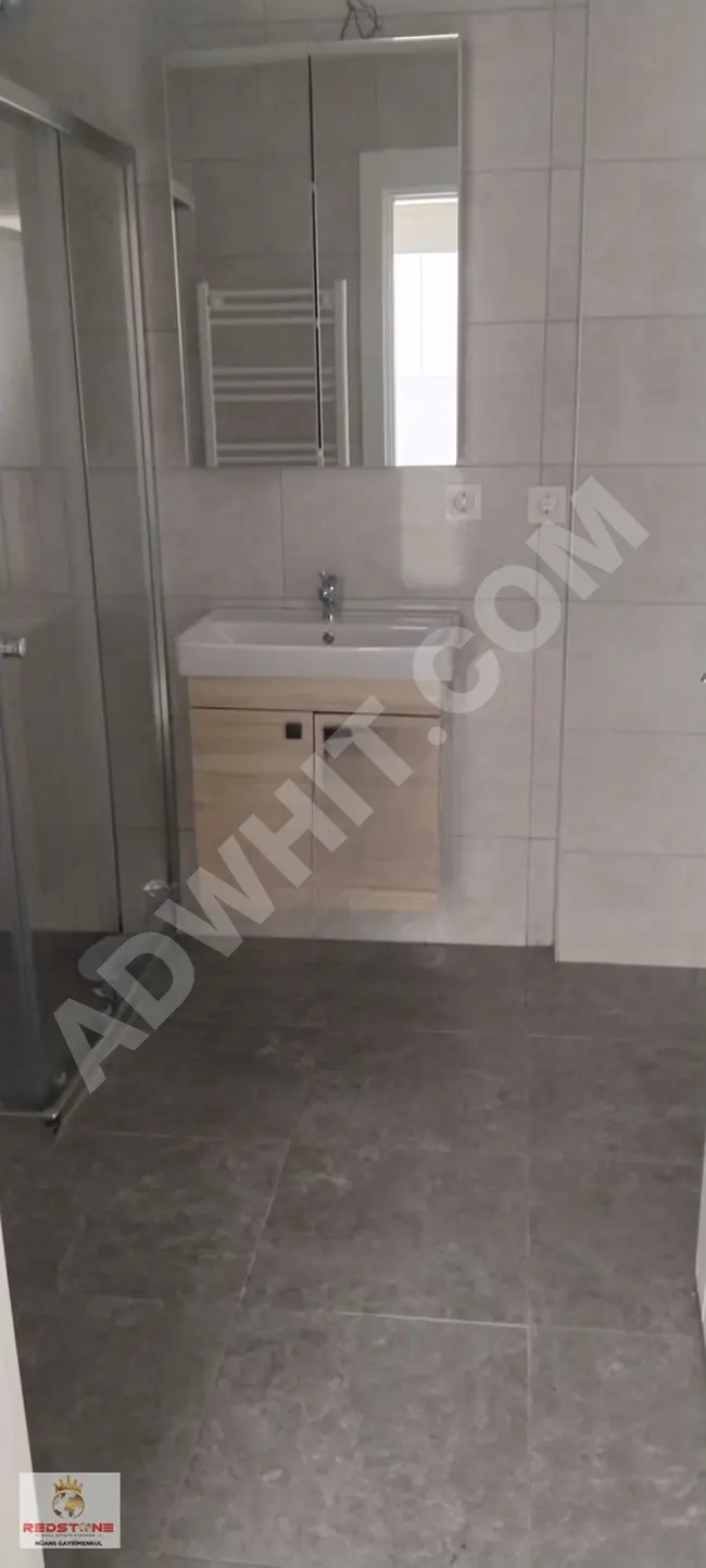 1+1 apartment for sale in the third section within the ÇANAKKALE BİGA KONAKLARI complex.