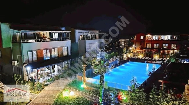 2+1 duplex apartment with a private garden in a residential complex with a swimming pool in ŞİLE.