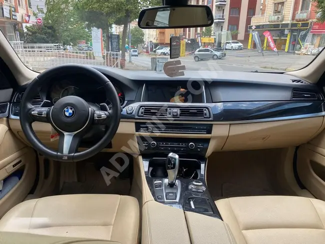 BMW 5 Series Model 2015 with digital dashboard, navigation system, electronic trunk, and PREMIUM heating.