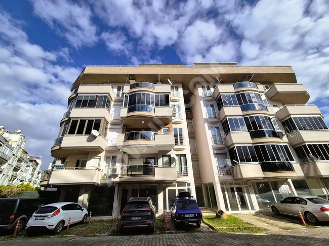 Apartment for sale 2+1 on a middle floor with a pool at the front facade from Alçınar Real Estate.