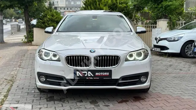 BMW 5 Series Model 2015 with digital dashboard, navigation system, electronic trunk, and PREMIUM heating.