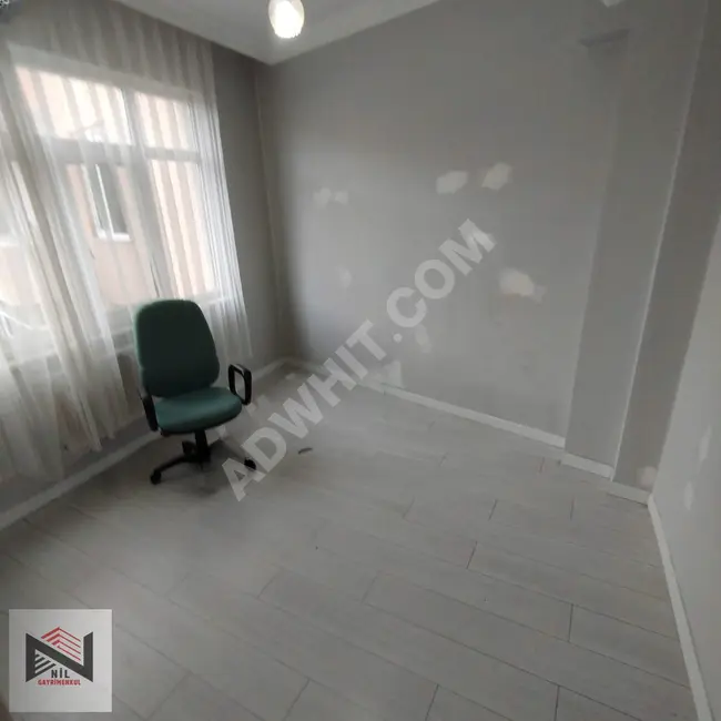 2+1 apartment with central heating system and two frontages in FATİH ŞEHREMİNİ