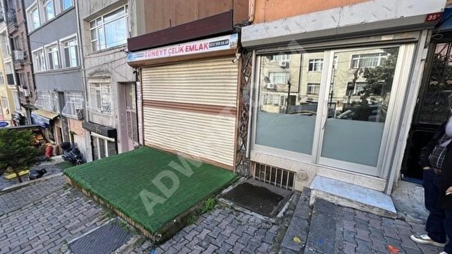 A two-story shop with a backyard garden, located on Akaglar Street.