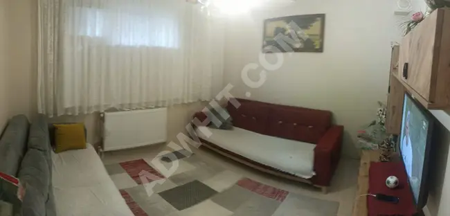 For sale: A 2+1 apartment on the ground floor in İnönü.