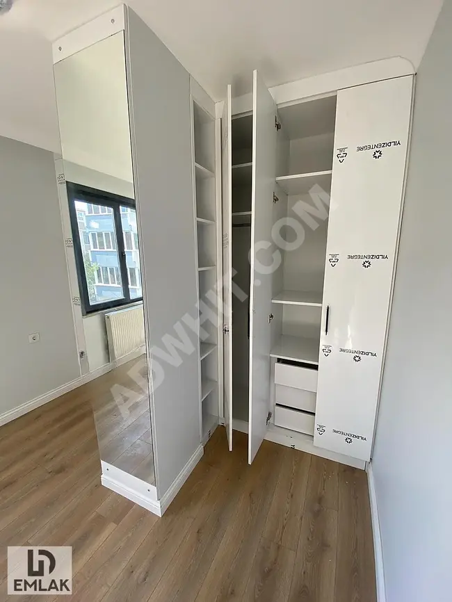 1+1 apartment with an area of 75m² on a mid-level floor, fully equipped (with integrated appliances) for rent from LİDYA EMLAK.