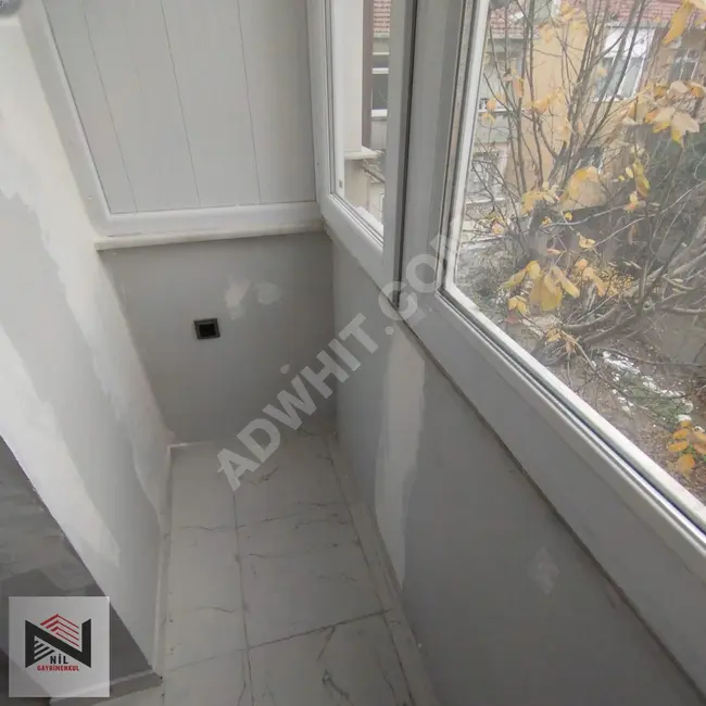 2+1 apartment with central heating system and two frontages in FATİH ŞEHREMİNİ