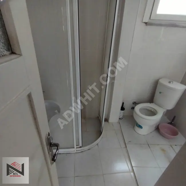 For rent: 2+1 apartment with two frontages and central heating in FATİH ŞEHREMİNİ.