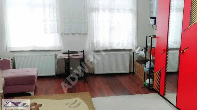 Apartment for sale 1+1 with a separate kitchen, covering an area of 55m, priced at 1,265,000 Turkish Liras.