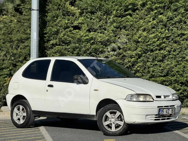 سيارة Fiat Palio كيلومترات منخفضة وفحص جديد منFEC MOTORS