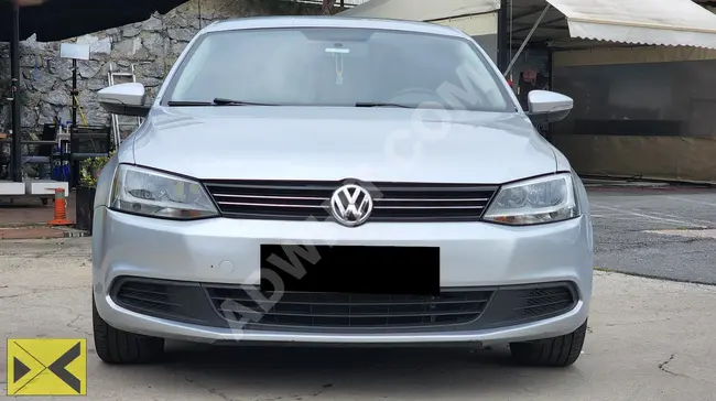 Volkswagen Jetta 2012 model, low kilometers - from DEZCAR