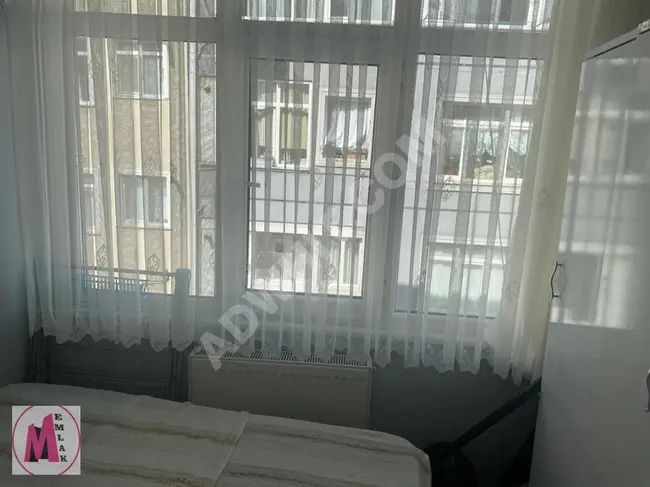 A furnished apartment in a central location with a fully equipped corner facade.