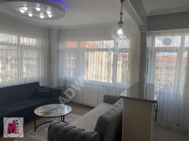 A furnished apartment in a central location with a fully equipped corner facade.