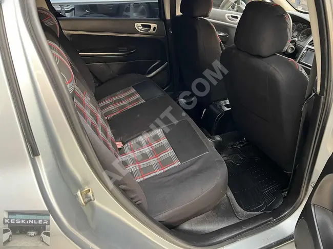 Peugeot 307 موديل 2003, **بخيارات تقسيط** سيارة بدون مصاريف، مُعتنى بها ودون مشاكل!