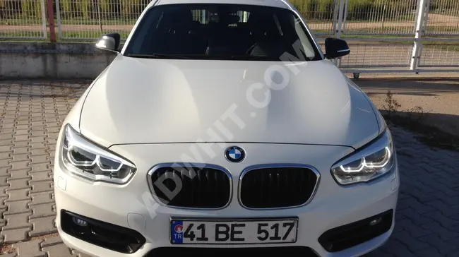 BMW 1.18i SPORT PLUS موديل 2015 - 4 أسطوانات - 132،500 كم. مسجّل في الخدمة بالكامل