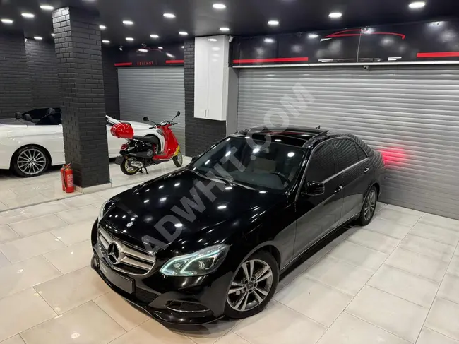 سيلرةMERCEDES E180 موديل 2013_206.000 كم_دخول بدون مفتاح_ذاكرة مزدوجة_باب كهربائي_تدفئة