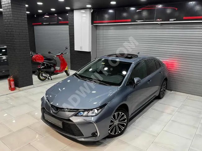 سيارة COROLLA  موديل 2021_50.000 كم_غير مطلية  _فتحة سقف_Flame X_تتبع المسار _كاميرا خلفية