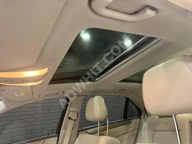 سيلرةMERCEDES E180 موديل 2013_206.000 كم_دخول بدون مفتاح_ذاكرة مزدوجة_باب كهربائي_تدفئة