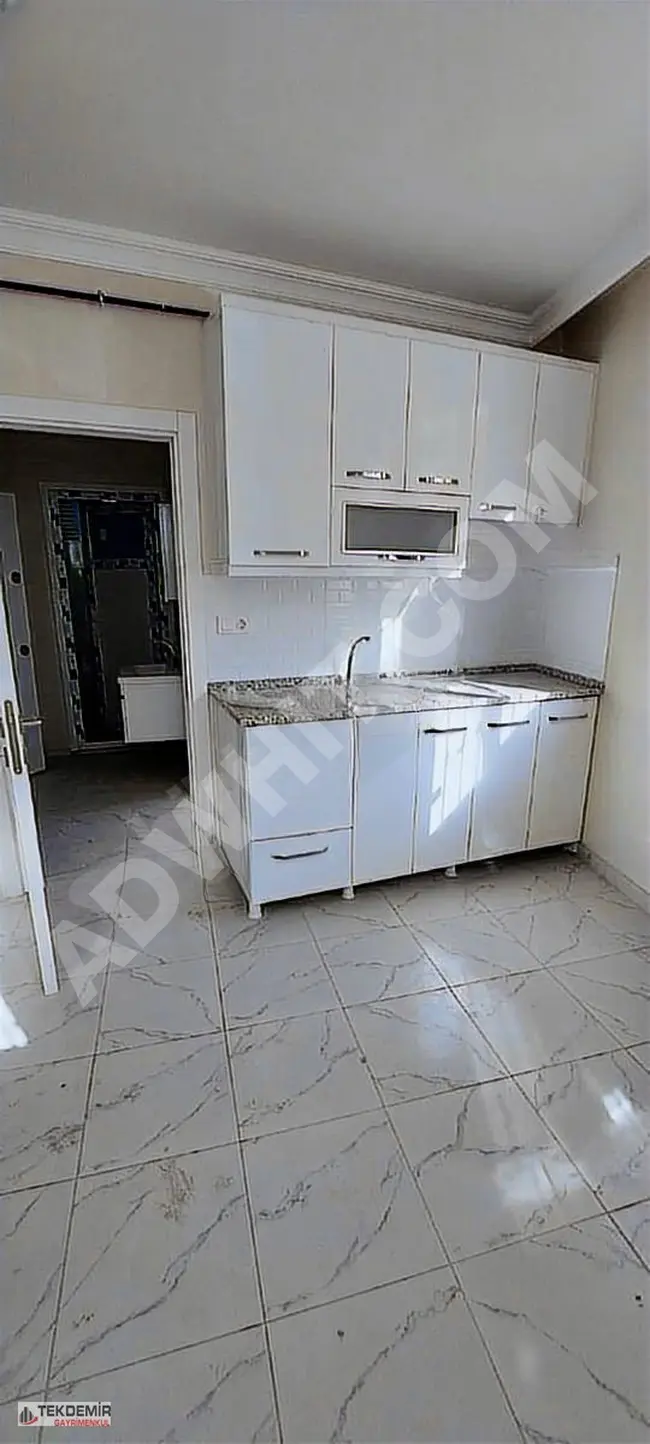 New 1+1 ground floor apartment with garden and mortgage loan from TEKDEMİR Real Estate