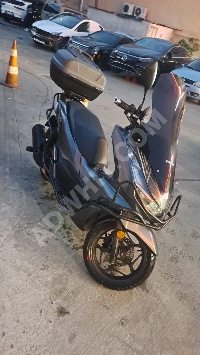 دراجة pcx125