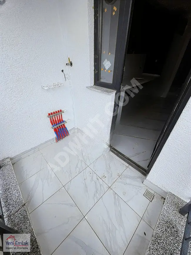 2+1 apartment in a new building, middle floor for sale by YENİ