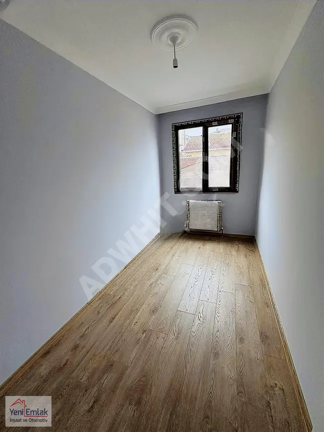 2+1 apartment with an area of 75m², middle floor for sale by YENİ