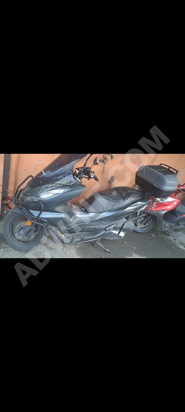 دراجة pcx125