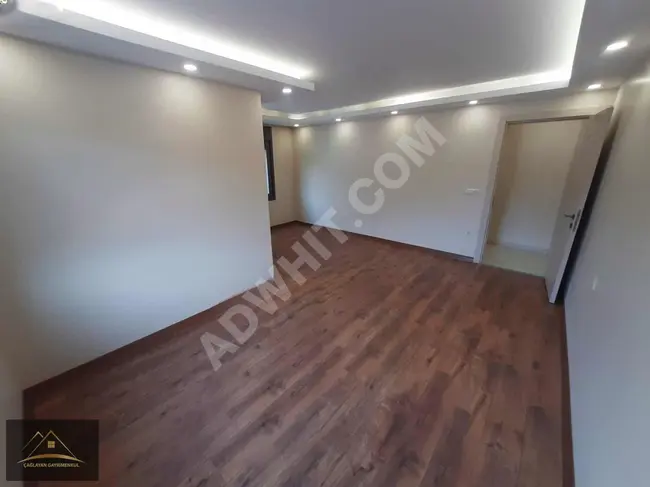 A 4+1 middle-floor apartment equipped with a smart home system with a new sea view for sale in İCADİYE.