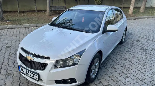 سيارة Cruze 1.6 LT موديل 2011 - بمسافة 201,000 كم - بنزين سائل - نظيفة جدًا