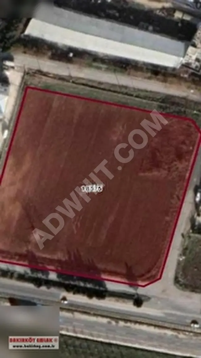 An industrial plot of land measuring 12,895.91 square meters with a 110-meter frontage to the E5 road in Selimpaşa.