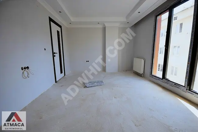 A new zero apartment 2+1 with an area of 85 square meters in the FEVZİÇAKMAK neighborhood near the street.