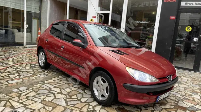 Peugeot 206 سيارة نظيفة ومصانة بشكل جيد وجميلة