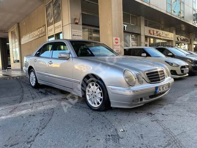 سيارة Mercedes - Benz E 200 CDI موديل 2001   أوتوماتيك  تعمل بالـغاز  LPG  بقوة 163 حصان قطعت 248,000 كم