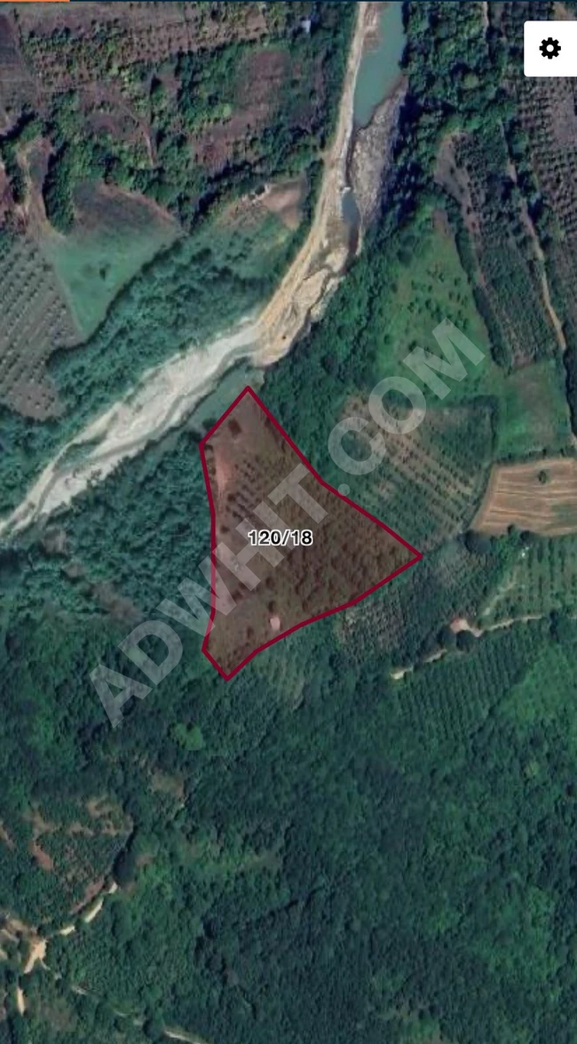 Land for sale with an area of 13,500 square meters in Bursa İnegöl Hacıkara.