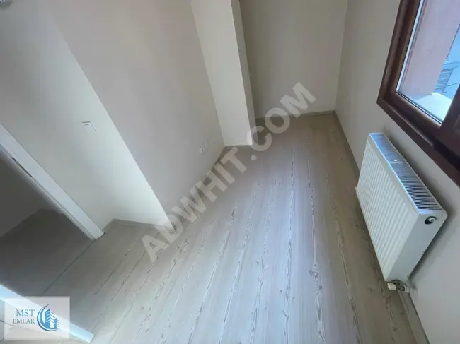 A clean new 2+1 apartment for rent with an elevator in MST EMLAK ÇİRÇİR