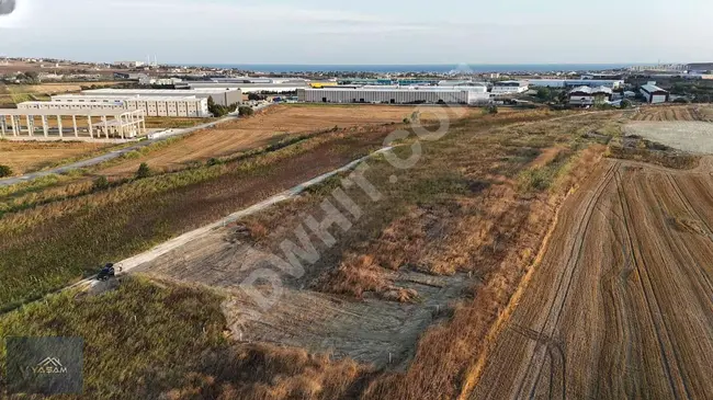 A plot of land with a road-facing frontage prepared for a two-and-a-half-story villa in SANCAKTEPE.