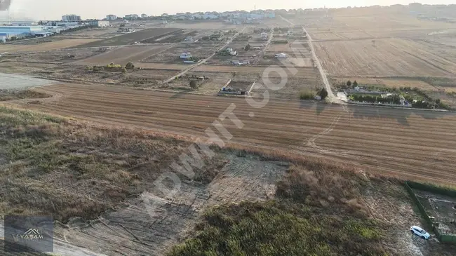 A plot of land with a road-facing frontage prepared for a two-and-a-half-story villa in SANCAKTEPE.