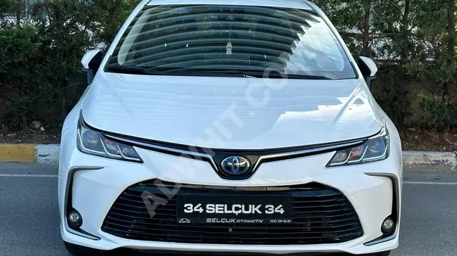 سيارة COROLLA 1.8 HYBRİD موديل 2021 - أوتوماتيكي تقسيط-مبادلة ممكنة