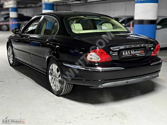 JAGUAR X-TYPE 2.1 V6 EXECUTIVE car, model 2007, with 107,500 km, featuring a touch screen.