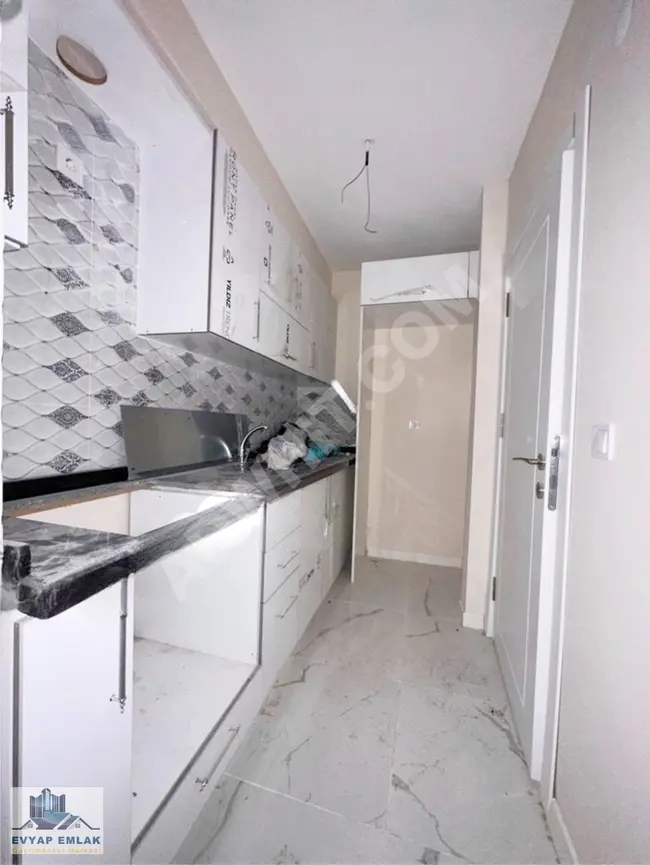 Ground floor apartment 2+1 near ÇAMLIK Street in a new building