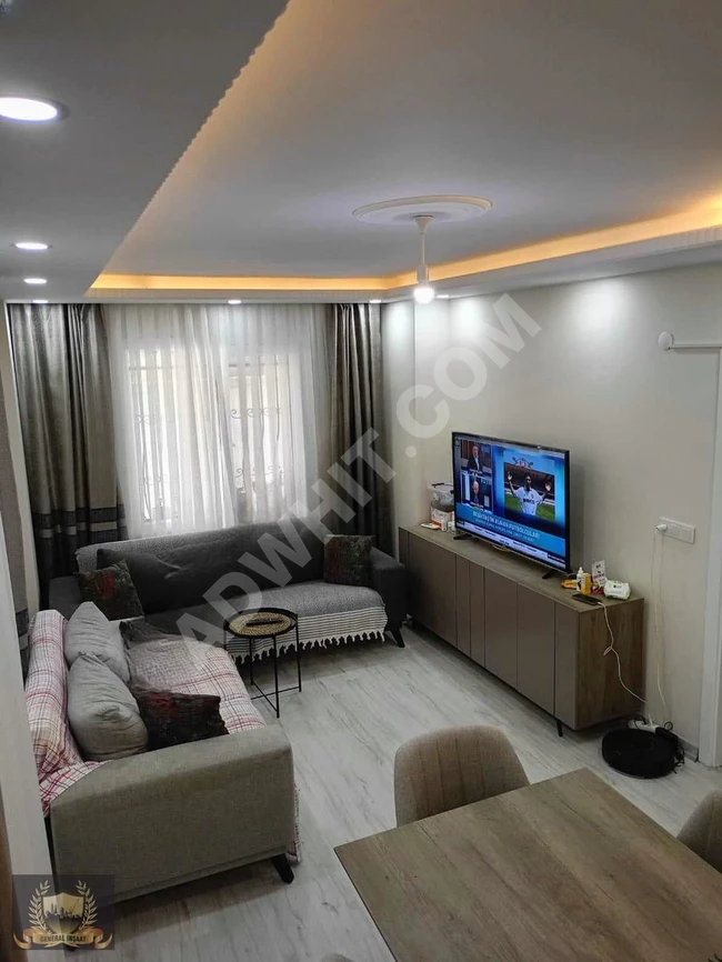 2+1 apartment with a separate kitchen and a garden in the center of AVCILAR