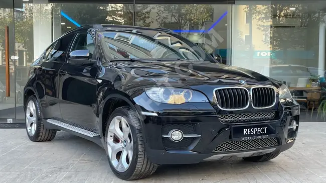 BMW X6 40D Model 2011, features heated seats, memory, sunroof, and electric trunk by RESPECT MOTORS.