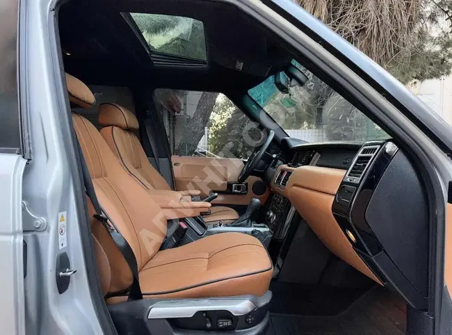 سيارة RANGE ROVER 4.4 V8 مع تجميل داخلي وخارجي