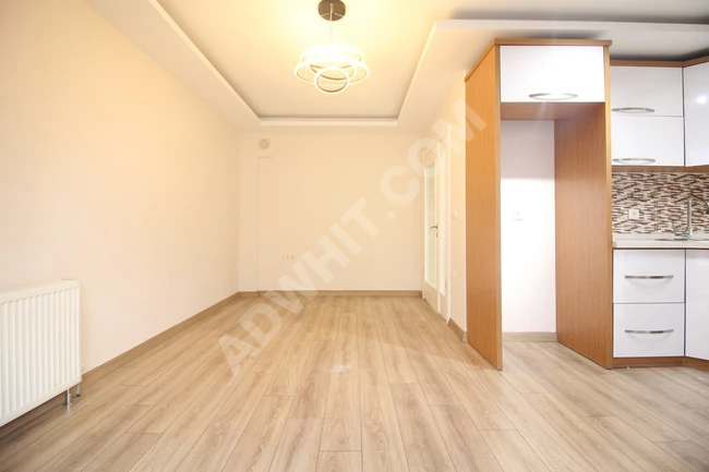 AKÇAY GAYRİMENKULDEN AKÇAYDA KALORİFERLİ ASANSÖRLÜ 2+1 DAİRE