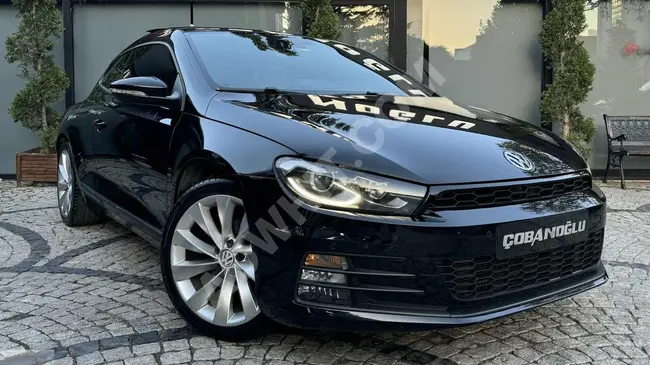 سيارة Volkswagen Scirocco موديل 2015 خالية من الأخطاء - سقف زجاجي - بمسافة 80,000 كم