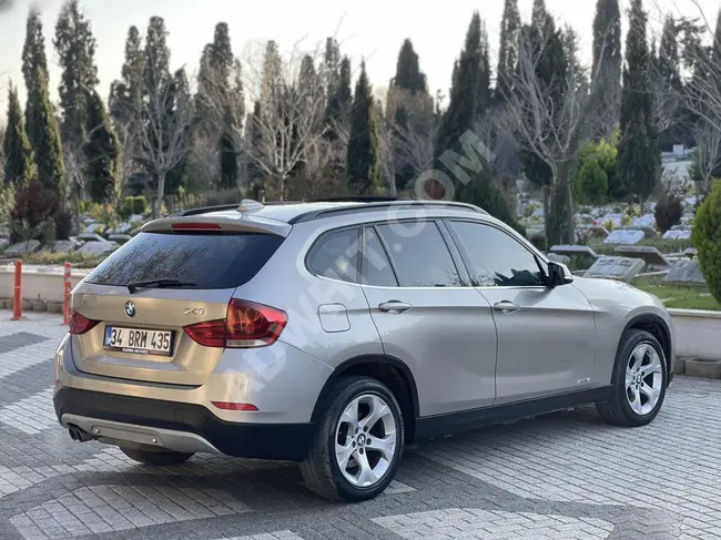 سيارة BMW X1 موديل 2014 بدون عيوب 88 ألف كيلو متر سقف زجاجي