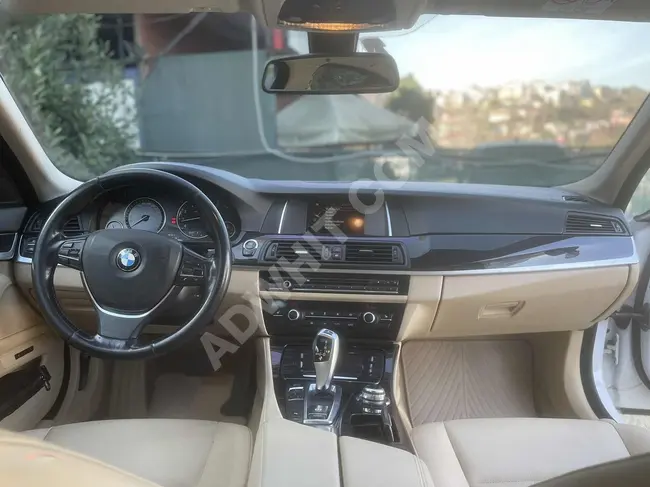 BMW 520i car, 2015 model, with sunroof and heating from Nisa Automotive.