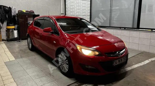 سيارة Opel Astra/1.3CTDI Edition Plus موديل 2015 شاشة تسلا بدون مصاريف اضافية