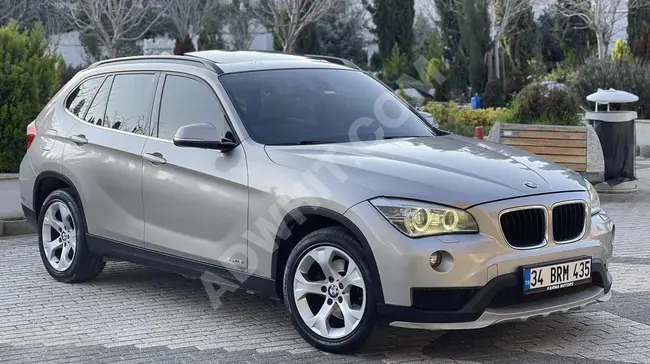 سيارة BMW X1 موديل 2014 بدون عيوب 88 ألف كيلو متر سقف زجاجي