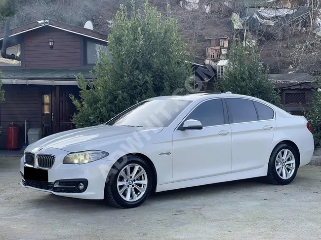 BMW 520i car, 2015 model, with sunroof and heating from Nisa Automotive.